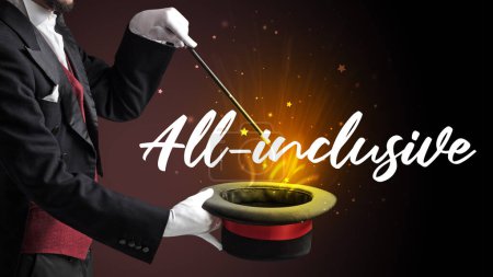 Photo for Magician is showing magic trick with All-inclusive inscription, traveling concept - Royalty Free Image