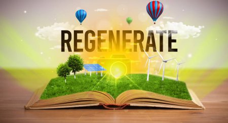 Foto de Libro abierto con inscripción REGENERATE, concepto de energía renovable - Imagen libre de derechos