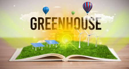 Photo for Open book with GREENHOUSE inscription, renewable energy concept - Royalty Free Image