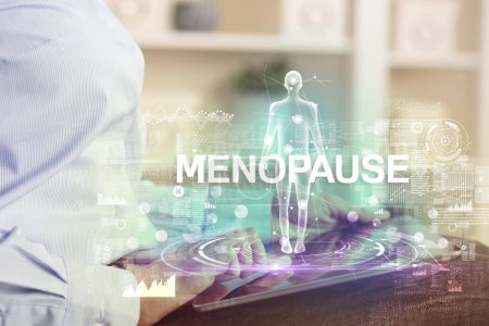 Electronic medical record with MENOPAUSE inscription, Medical technology concept