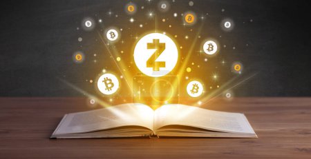 Photo for Open book with zcash icons above, currency exchange concept - Royalty Free Image