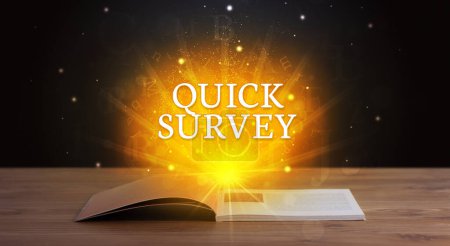 Photo for QUICK SURVEY inscription coming out from an open book, educational concept - Royalty Free Image