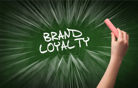 Photo for Hand drawing BRAND LOYALTY inscription with white chalk on blackboard, online shopping concept - Royalty Free Image