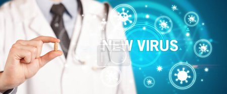 Photo for Doctor giving pill with NEW VIRUS inscription, coronavirus concept - Royalty Free Image