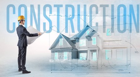 Photo for Young engineer holding blueprint with CONSTRUCTION inscription, house planning concept - Royalty Free Image