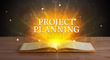 Photo for PROJECT PLANNING inscription coming out from an open book, educational concept - Royalty Free Image