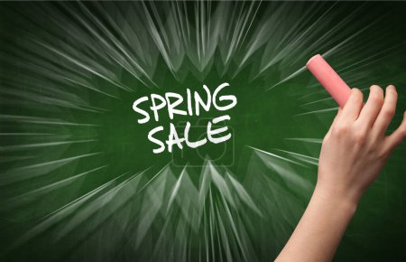 Photo for Hand drawing SPRING SALE inscription with white chalk on blackboard, online shopping concept - Royalty Free Image