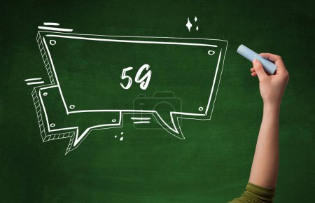 Photo for Hand drawing 5G abbreviation with white chalk on blackboard - Royalty Free Image