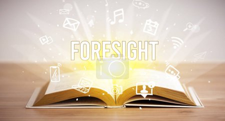 Foto de Libro Opeen con inscripción FORESIGHT, concepto de negocio - Imagen libre de derechos