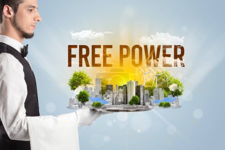 Photo for Waiter serving eco city with FREE POWER inscription, renewabke energy concept - Royalty Free Image