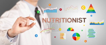 Photo for Nutritionist giving you a pill with NUTRITIONIST inscription, healthy lifestyle concept - Royalty Free Image