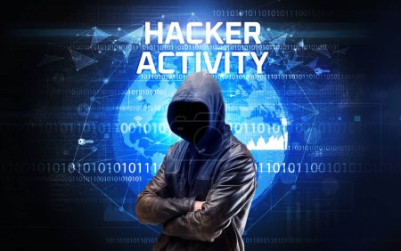 Photo for Faceless hacker at work with HACKER ACTIVITY inscription, Computer security concept - Royalty Free Image
