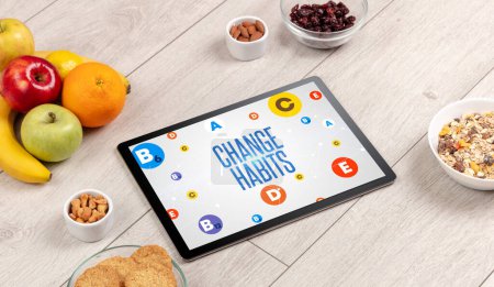 Photo for Healthy Tablet Pc compostion with CHANGE HABITS inscription, weight loss concept - Royalty Free Image