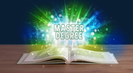 Photo for MASTER DEGREE inscription coming out from an open book, educational concept - Royalty Free Image