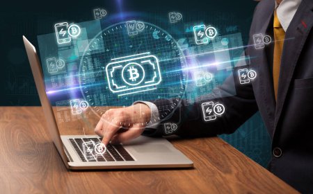 Photo for Business hand working in stock market with bitcoin cash icons coming out from laptop screen - Royalty Free Image