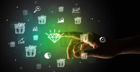 Photo for Businessman finger touching on screen multimedia interface with hand drawn diamond icons futuristic concept - Royalty Free Image