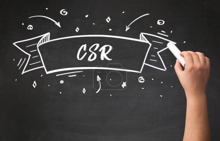 Photo for Hand drawing CSR abbreviation with white chalk on blackboard - Royalty Free Image