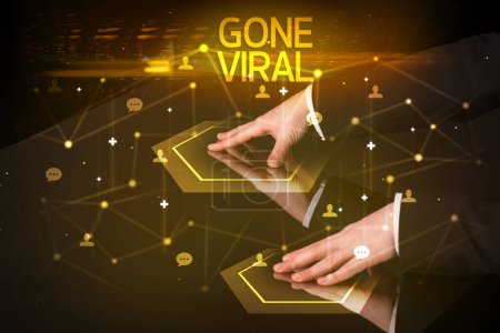 Photo for Navigating social networking with GONE VIRAL inscription, new media concept - Royalty Free Image