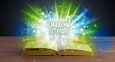 Foto de BRIGHT IDEAS inscripción que sale de un libro abierto, concepto educativo - Imagen libre de derechos