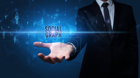 Photo for Elegant hand holding SOCIAL GRAPH inscription, social networking concept - Royalty Free Image