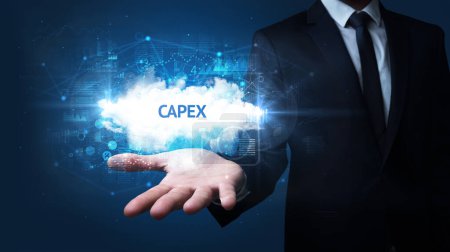 Téléchargez les photos : Main d'homme d'affaires détenant l'inscription CAPEX, concept d'entreprise à succès - en image libre de droit