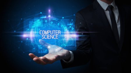 Foto de Mano del hombre sosteniendo la inscripción de la ciencia del ordenador, concepto de la tecnología - Imagen libre de derechos