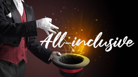 Photo for Magician is showing magic trick with All-inclusive inscription, traveling concept - Royalty Free Image