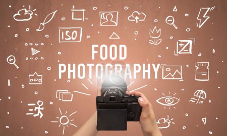 Photo for Hand taking picture with digital camera and FOOD PHOTOGRAPHY inscription, camera settings concept - Royalty Free Image