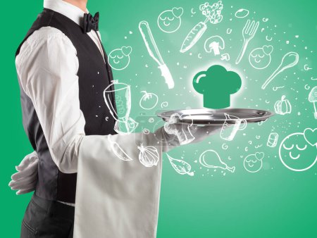 Photo for Waiter holding silver tray with chef hat icons coming out of it, health food concept - Royalty Free Image