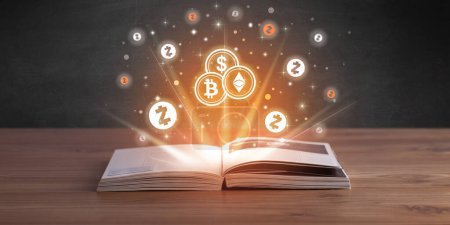 Photo for Open book with cryptocurrencies icons above, currency exchange concept - Royalty Free Image