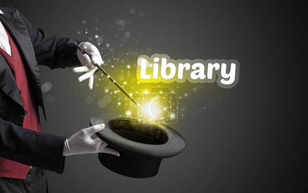 Photo for Magician is showing magic trick with Library inscription, educational concept - Royalty Free Image