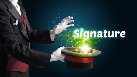 Photo for Magician is showing magic trick with Signature inscription, educational concept - Royalty Free Image