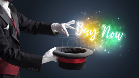 Photo for Magician hand conjure with wand and Buy Now inscription, shopping concept - Royalty Free Image