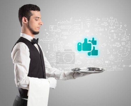 Photo for Close-up of waiter serving likes icons, social media concept - Royalty Free Image