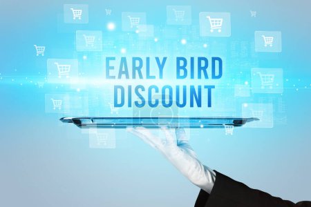 Photo for Waiter serving EARLY BIRD DISCOUNT inscription, online shopping concept - Royalty Free Image