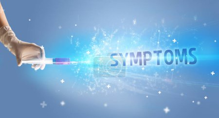 Photo for Syringe, medical injection in hand with SYMPTOMS inscription, medical antidote concept - Royalty Free Image