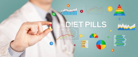 Photo for Nutritionist giving you a pill with DIET PILLS inscription, healthy lifestyle concept - Royalty Free Image