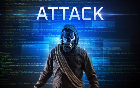 Foto de Pirata informático sin rostro con inscripción ATTACK en un fondo de código binario - Imagen libre de derechos