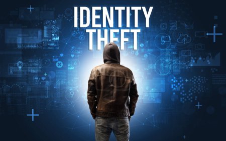 Photo for Faceless man with IDENTITY THEFT inscription, online security concept - Royalty Free Image
