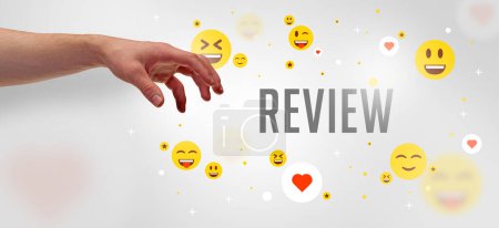 Photo for Close-Up of cropped hand pointing at REVIEW inscription, social media concept - Royalty Free Image