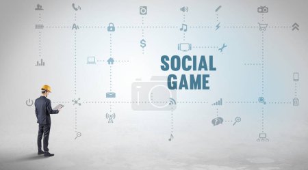 Ingénieur travaillant sur une nouvelle plateforme de médias sociaux avec le concept d'inscription SOCIAL GAME