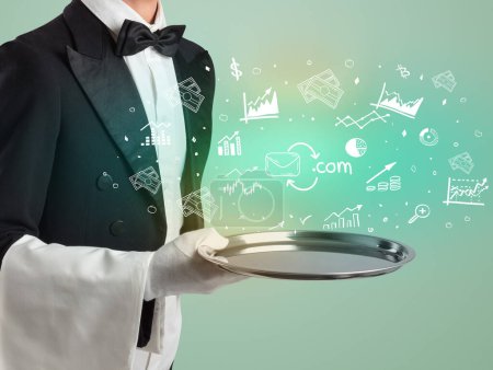 Photo for Handsome young waiter in tuxedo holding tray with sent mail icons on tray, global market concept - Royalty Free Image