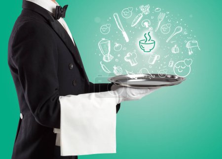 Photo for Waiter holding silver tray with soup icons coming out of it, health food concept - Royalty Free Image