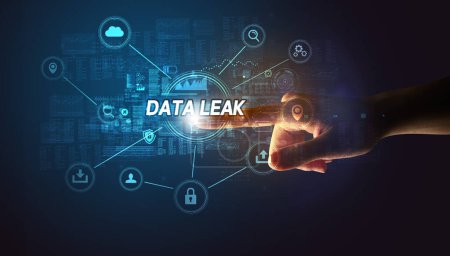 Hand touching DATA LEAK inscription, Cybersecurity concept concept