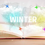 Open book with WINTER inscription, vacation concept