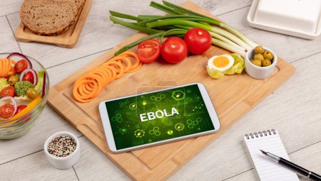 Photo for Healthy Tablet Pc compostion with EBOLA inscription, immune system boost concept - Royalty Free Image