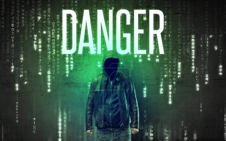 Faceless hacker with DANGER inscription, hacking concept