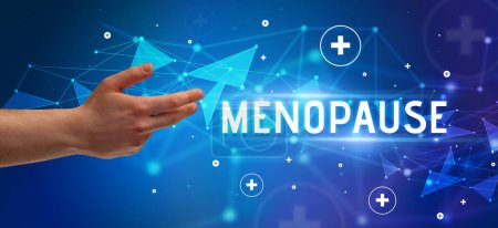 Photo for Close-Up of cropped hand pointing at MENOPAUSE inscription, medical concept - Royalty Free Image