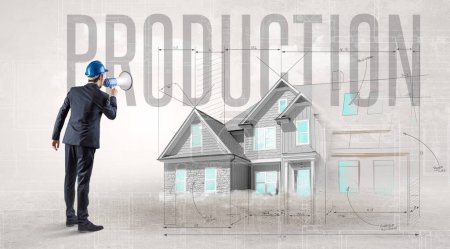 Photo for Young engineer holding blueprint with PRODUCTION inscription, house planning concept - Royalty Free Image