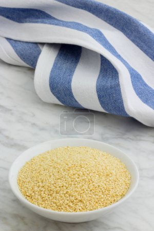 Photo for Sesame seeds a great source of healthy fats, protein and vitamins; widely used on the most delicious baked products. - Royalty Free Image